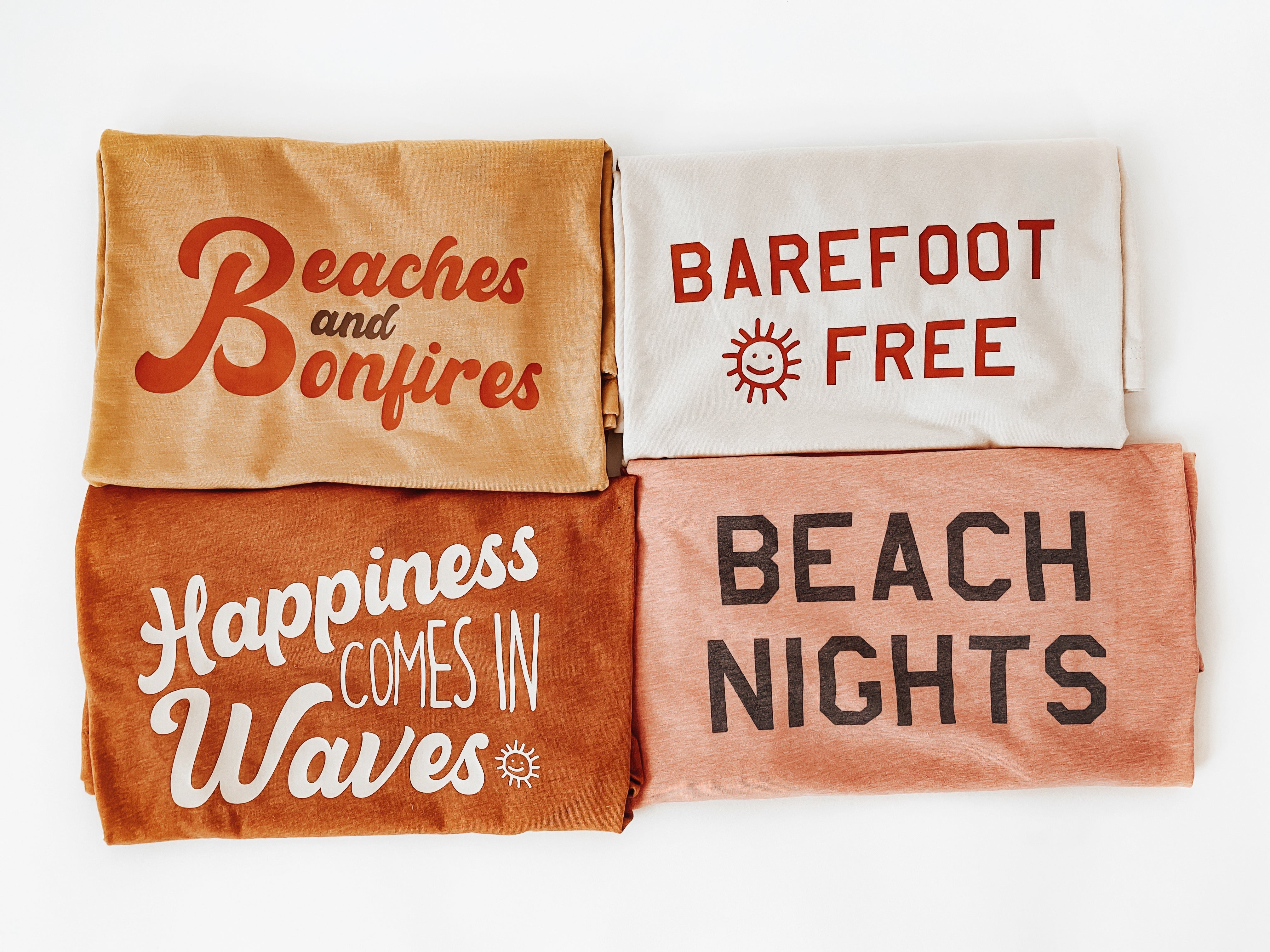 Group shot of fall-themed Bella and Canvas shirts with a "Beach Vibes" design, showcasing a blend of autumn style and coastal relaxation.