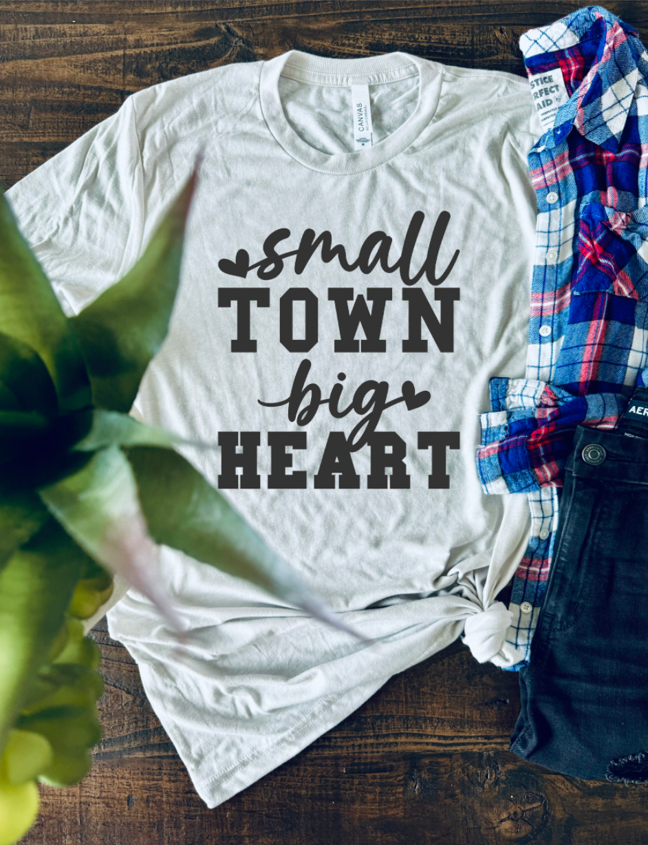 Small Town Big Heart vintage country girl western t-shirt. Unisex T-Shirt from Bella and Canvas in Cement.