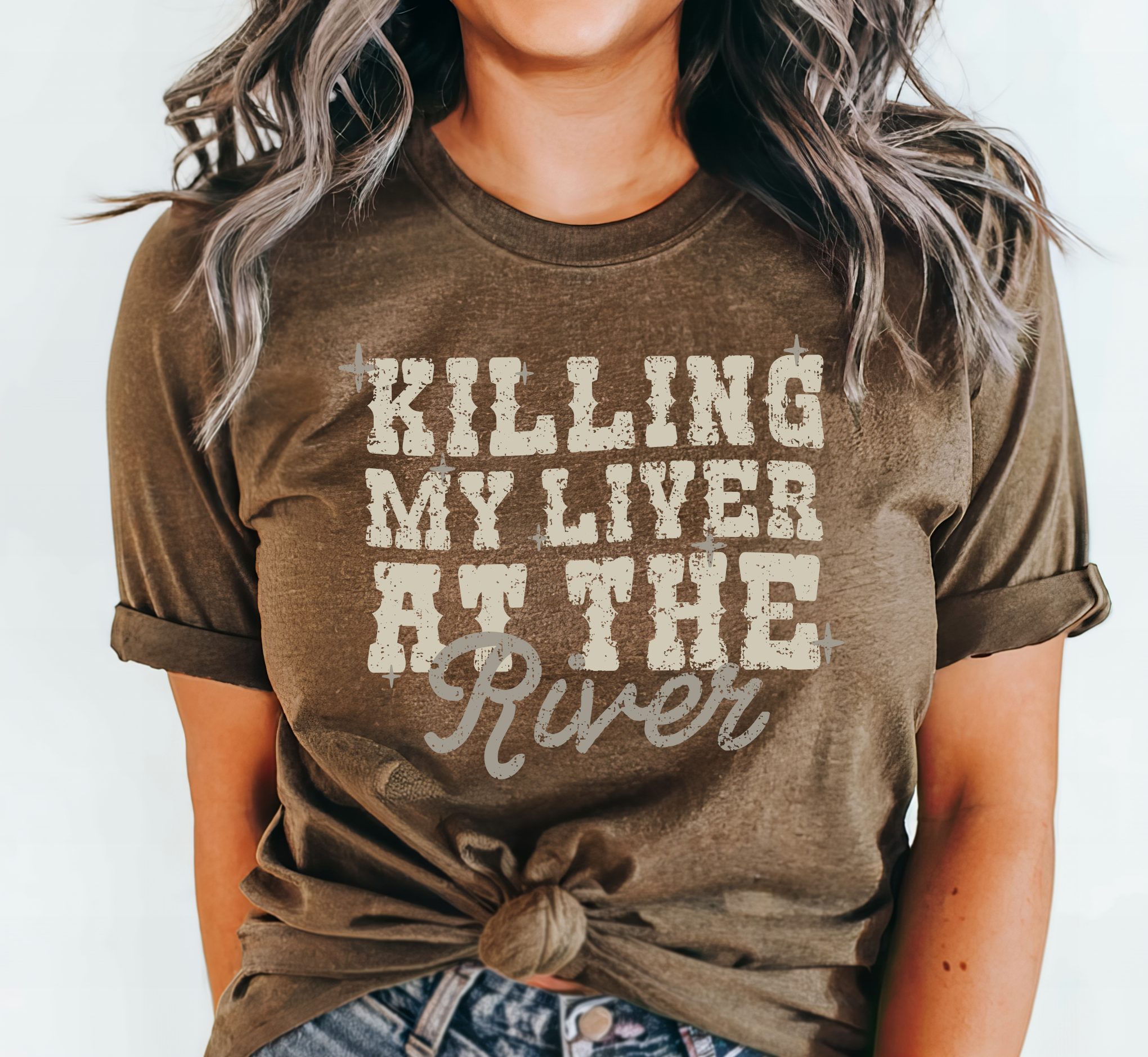 Funny river shirt with Killing my Liver at the River on it. Bella and Canvas unisex shirt in brown.