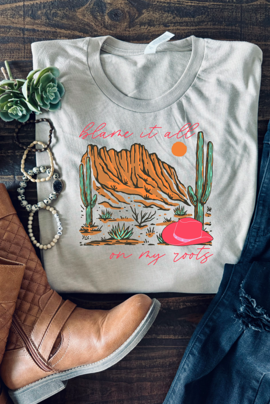 Blame it all on my roots. Bella and Canvas soft tee in Tan. Hand made and shipped from Texas.