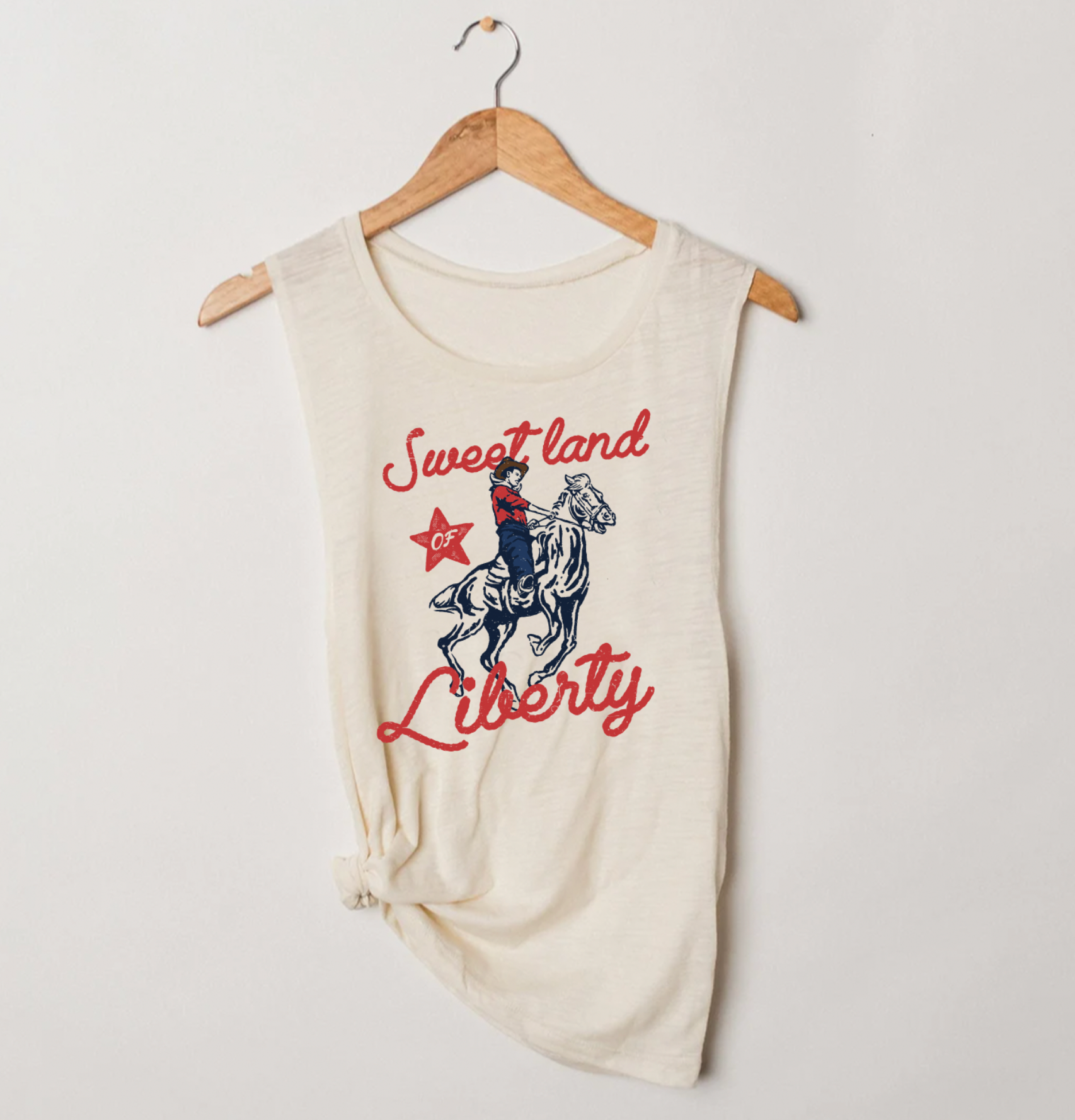 Sweet land of Liberty vintage inspired western graphic ladies muscle tank. Bella and Canvas cream.