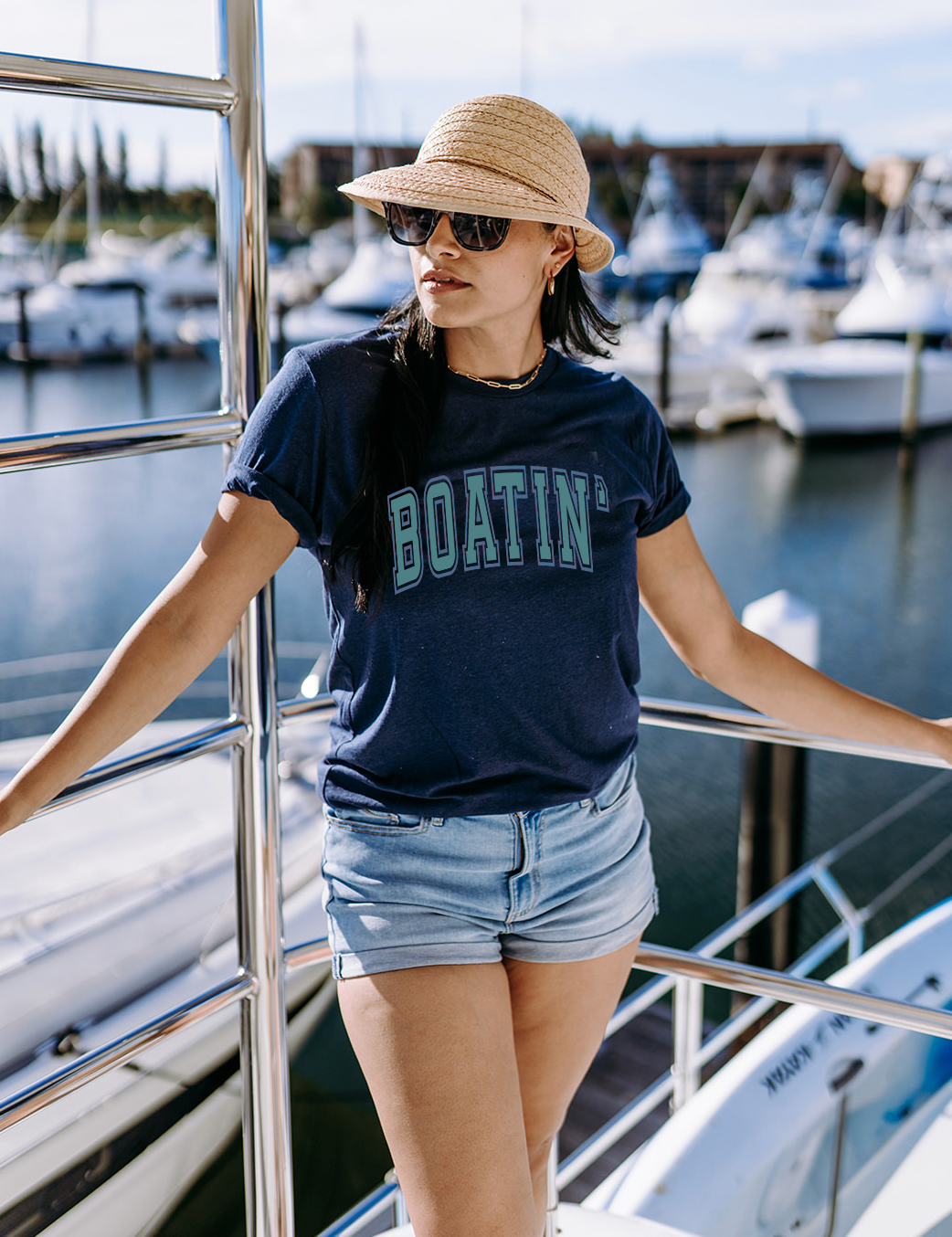 Summer and lake ready, Boatin' shirt made for our boat days. Bella and Canvas super soft unisex shirt in Navy.
