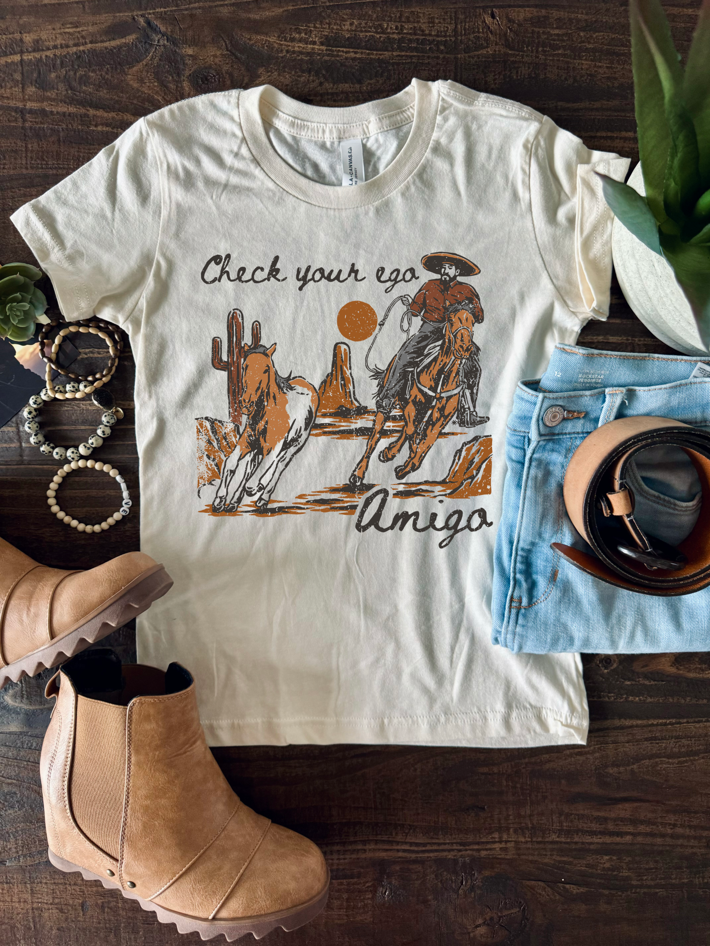 Vintage western country girl tshirt with Check your Ego Amigo on it.
