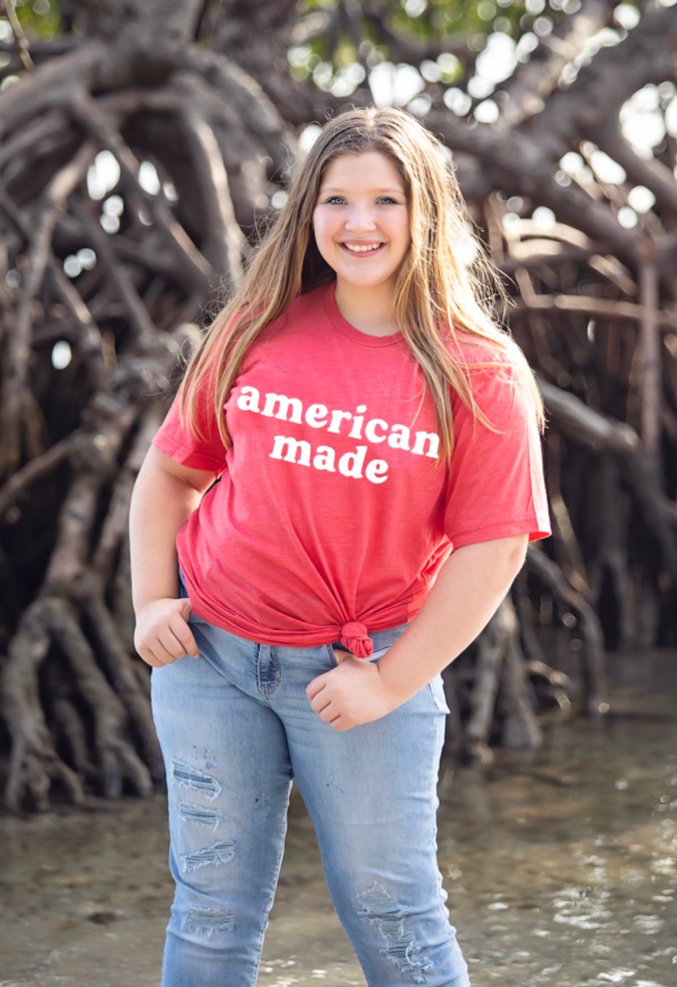 American Made. Bella and Canvas super soft t-shirt proudly made in the USA with beach vibes. Color shirt is heather red.
