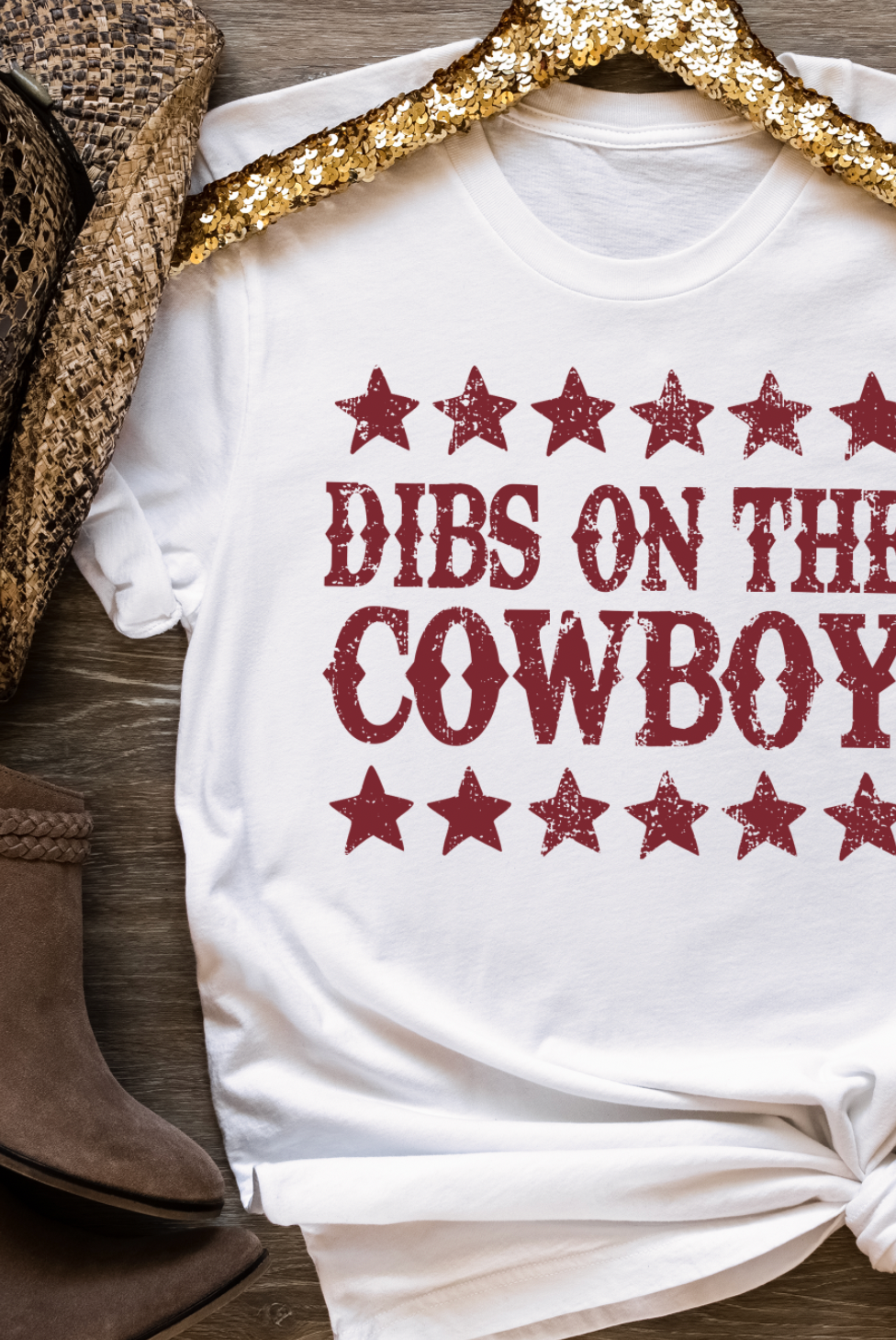 Vintage western country girl graphic tee with Dibs on the Cowboy on it. Bella and Canvas white unisex tshirt.