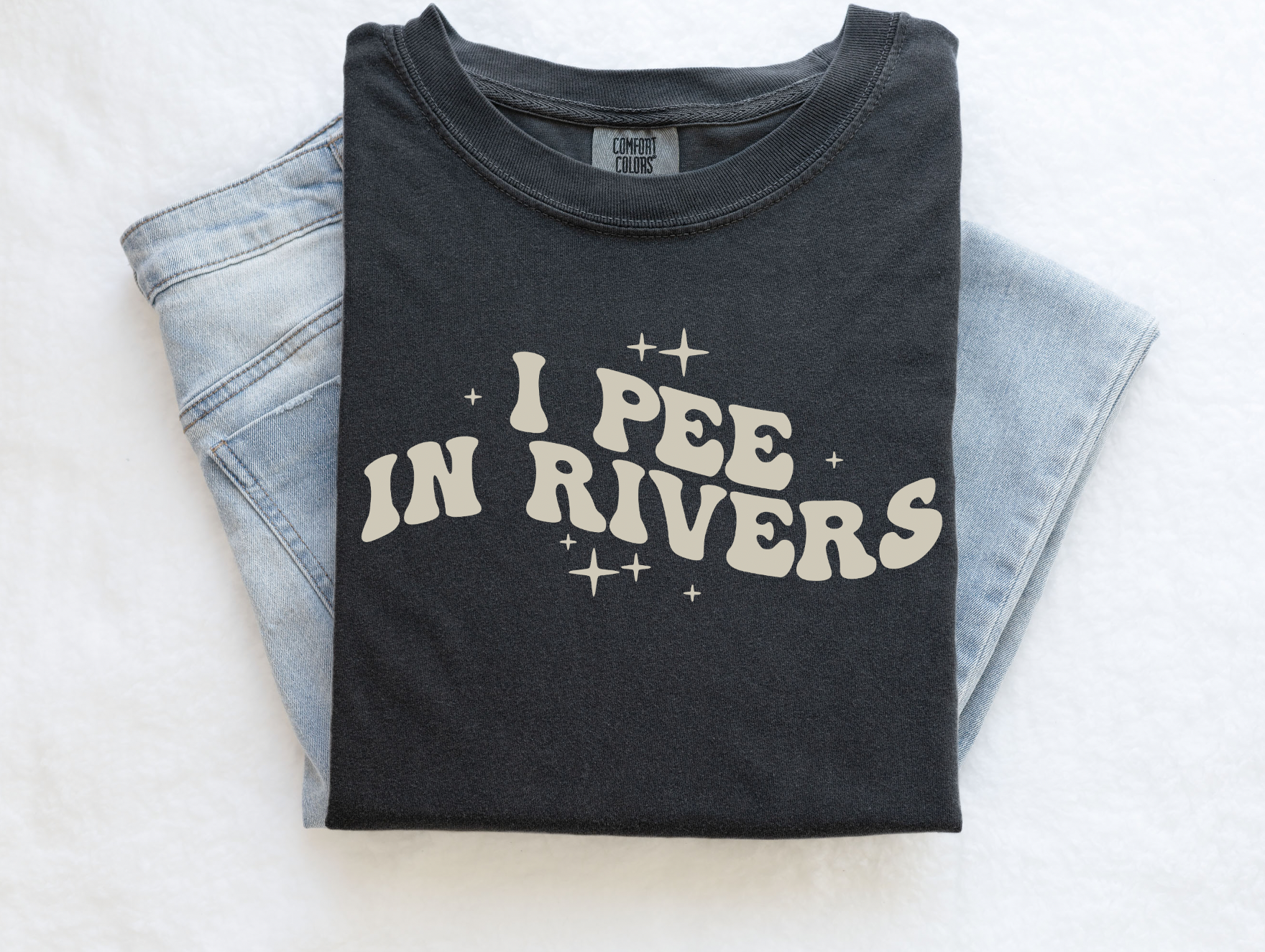 I pee in rivers. Funny graphic tee for river lovers. Comfort Colors brand shirt in Pepper color.