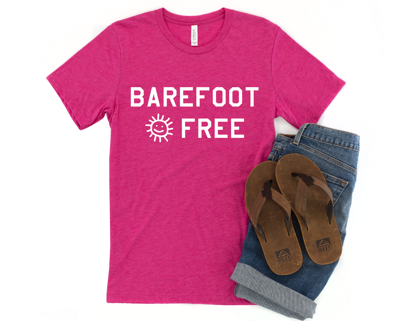 Bright Pink T-shirt with the text "Barefoot and Free," featuring a relaxed and carefree design that embodies a laid-back, free-spirited lifestyle.