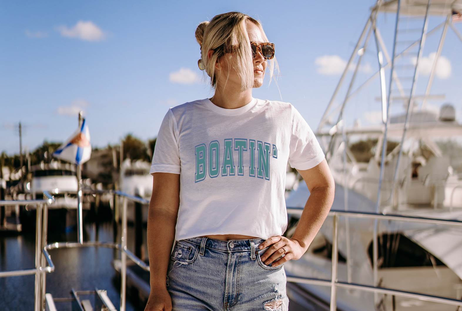 Summer and lake ready, Boatin' shirt made for our boat days. Bella and Canvas super soft unisex shirt in White.