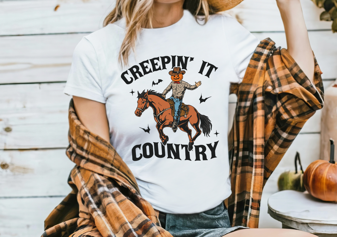 Creepin' It Country shirt with fun design, featuring soft and comfortable fabric, perfect for a spooky and country look. White shirt.