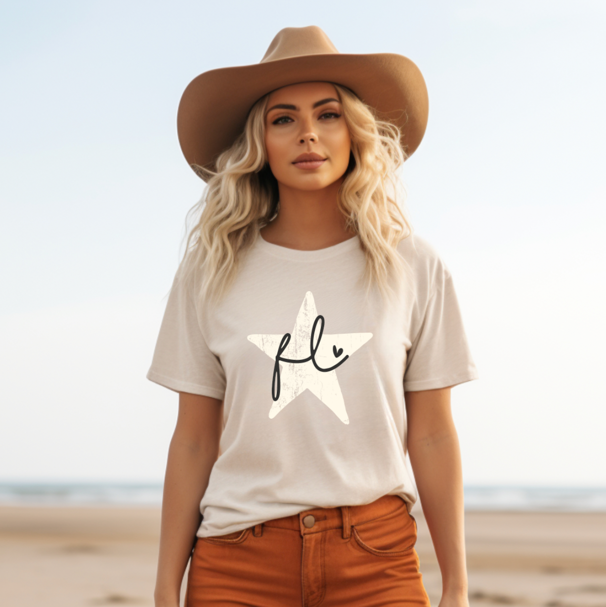 Cream colored soft shirt from Bella and Canvas, this shirt has a rustic star with Florida written in cursive with an adorable heart.