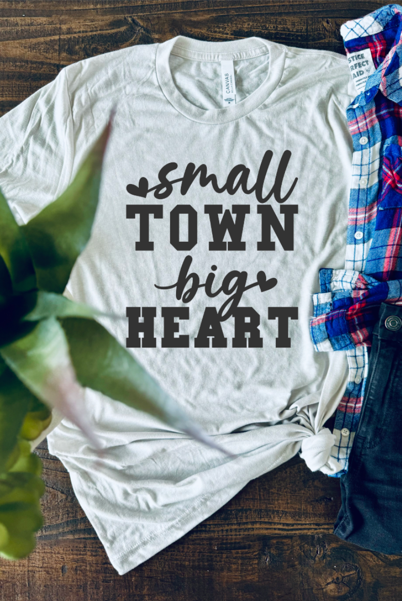 Small Town Big Heart vintage country girl western t-shirt. Unisex T-Shirt from Bella and Canvas in Cement.