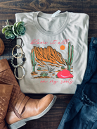 Blame it all on my roots. Bella and Canvas soft tee in Tan. Hand made and shipped from Texas.