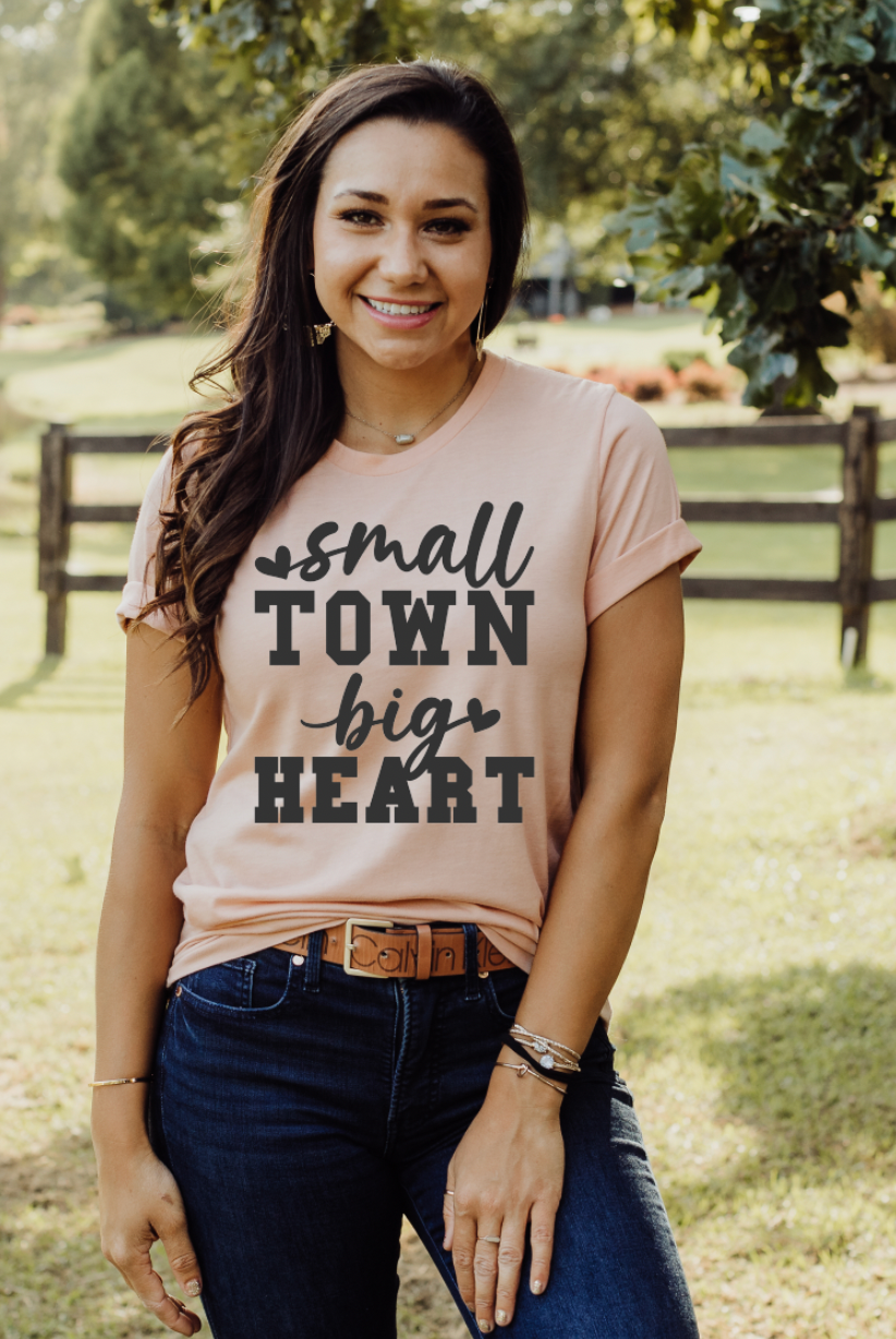 Small Town Big Heart vintage country girl western t-shirt. Unisex T-Shirt from Bella and Canvas in peach.