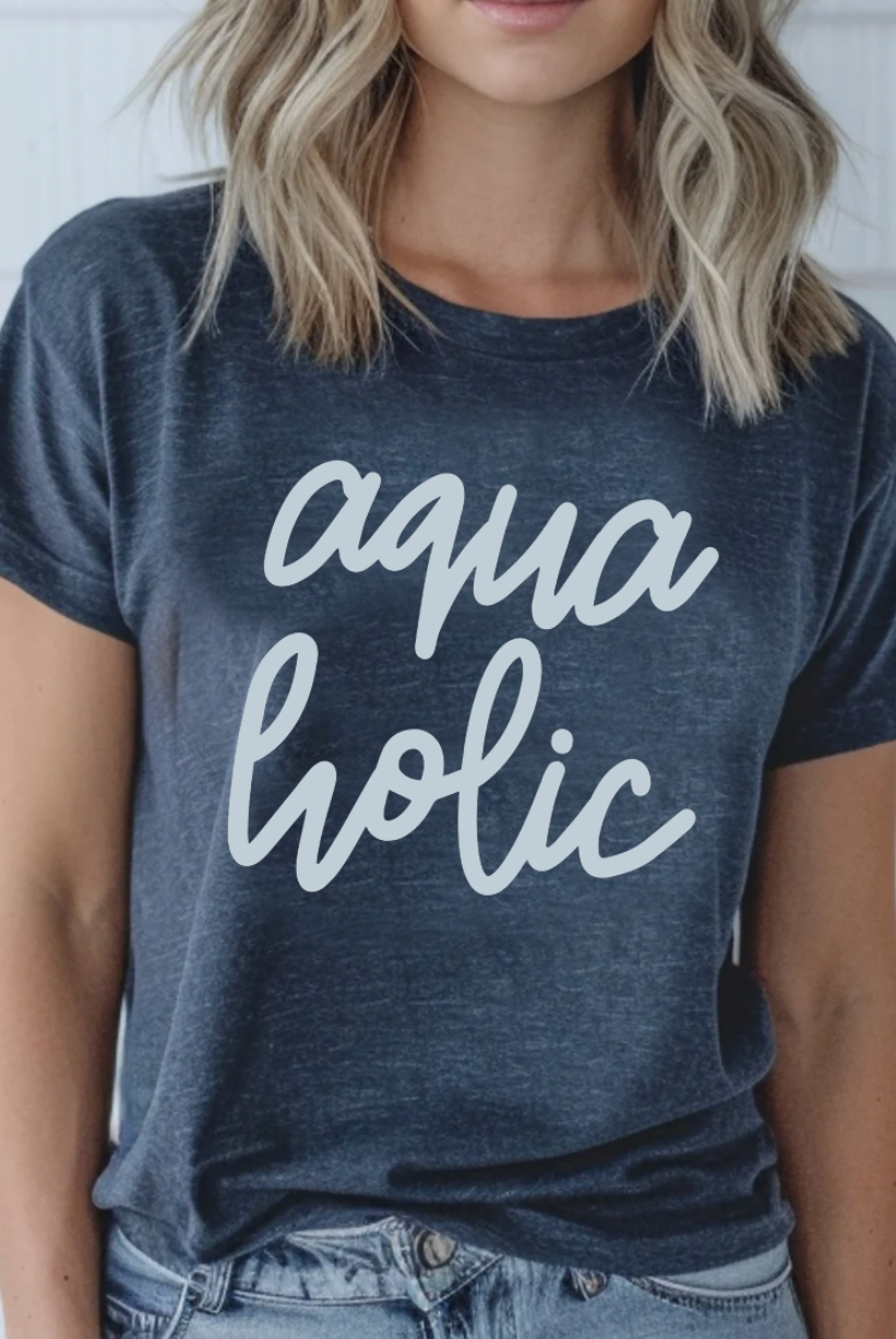 Aquaholic beach girl, summer shirt or tank. Water love Aquaholic design. Heather Navy T-Shirt from Bella and Canvas.