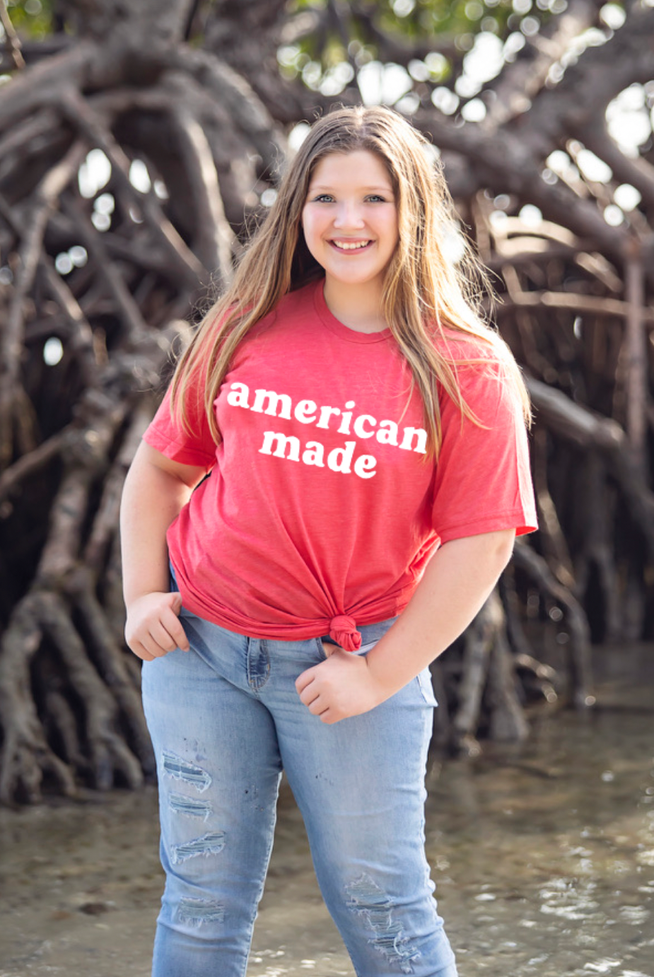 American Made. Bella and Canvas super soft t-shirt proudly made in the USA. Color shirt is haether red.