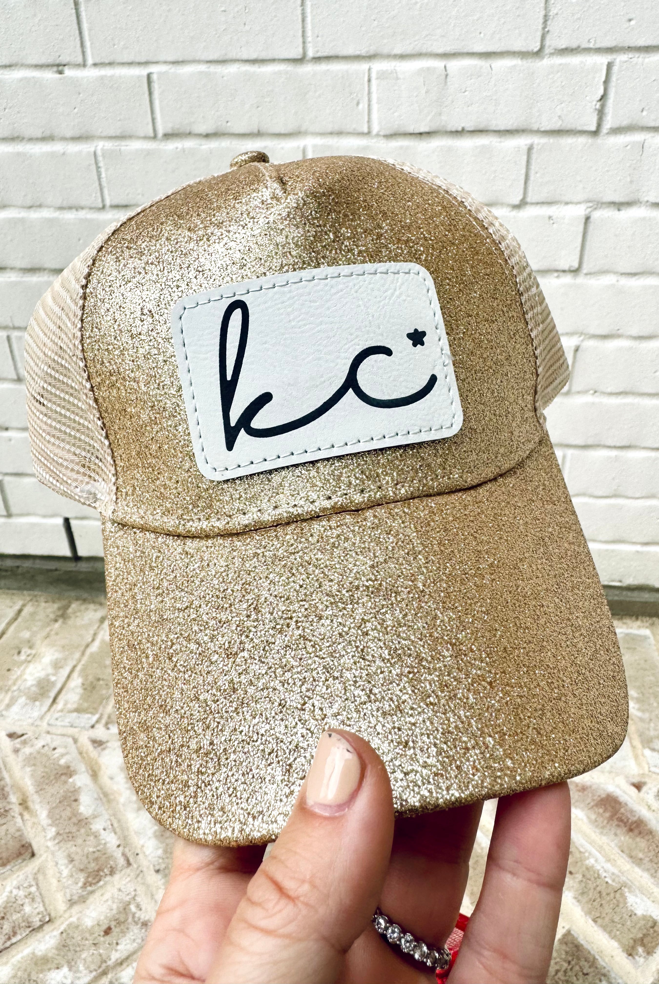 Kansas City Star Ladies Glitter Ponytail Hats in Gold Khaki color with white leather laser engraved patch.