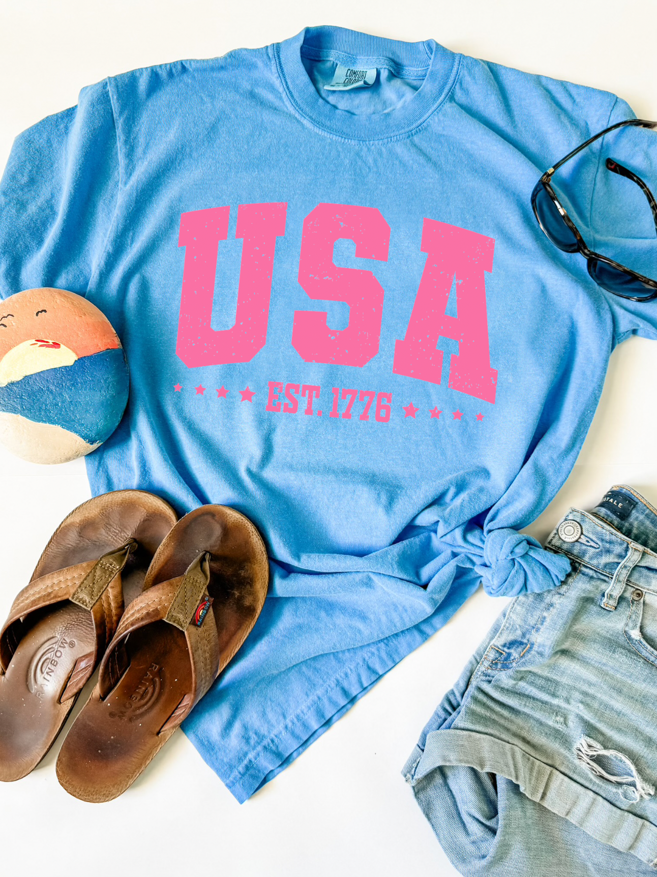 Bright summer beach girl shirt. USA Est. 1776, 4th of July shirt. Comfort Color Neon Blue.
