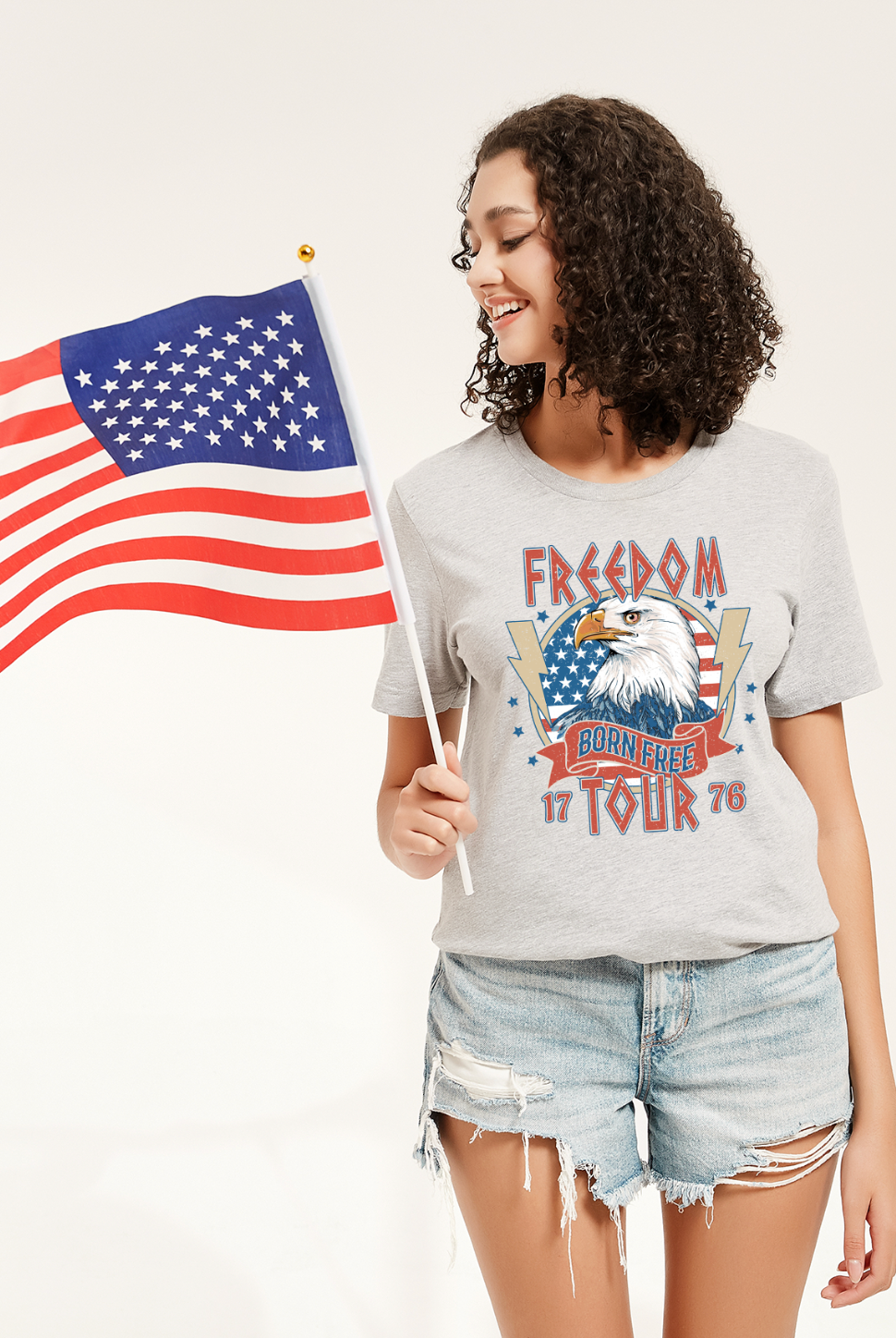 Freedom Tour. Born Free 1776. Vintage Americana 4th of Julysoft t-shirt from Bella and Canvas. Color shirt is light gray, athletic heather gray.