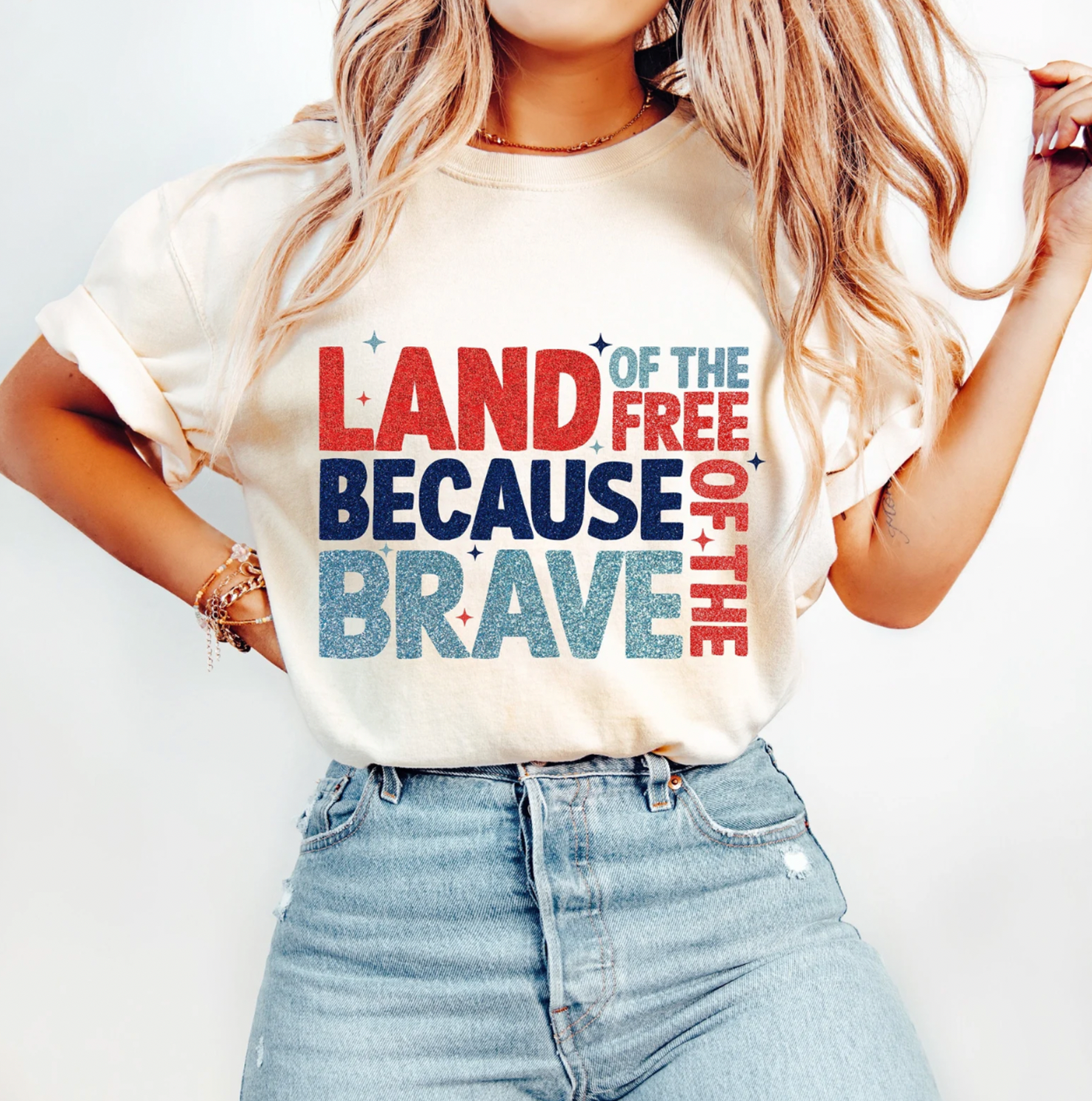 Land of the Free Because of the Brave American Americana Tshirt. Bella and Canvas, made in the USA. Shirt is Cream.