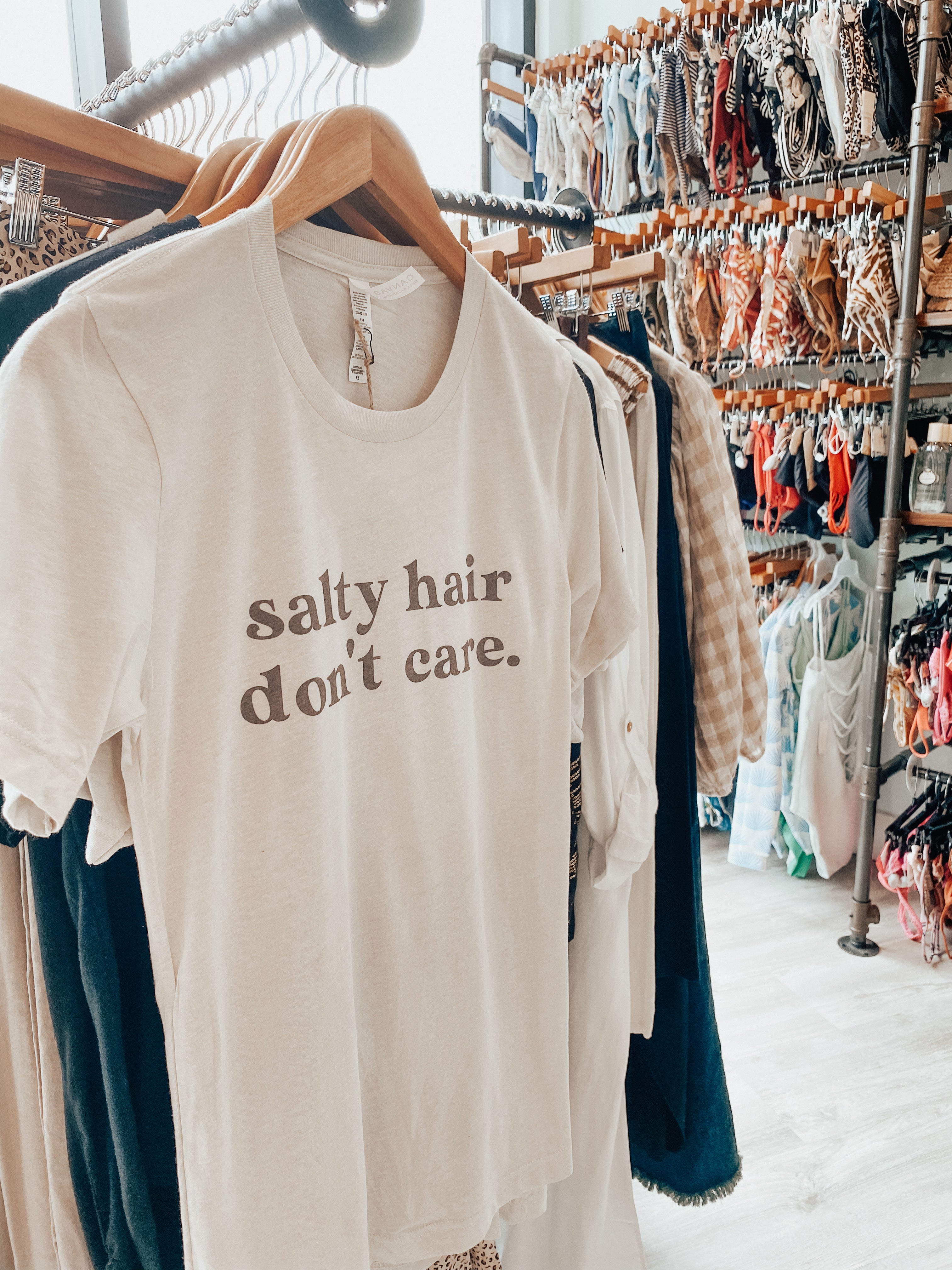 Salty Hair Don't Care super soft beach shirt for summer. Beach girl, ocean girl shirt. Bella and Canvas unisex shirt in Cement Color.