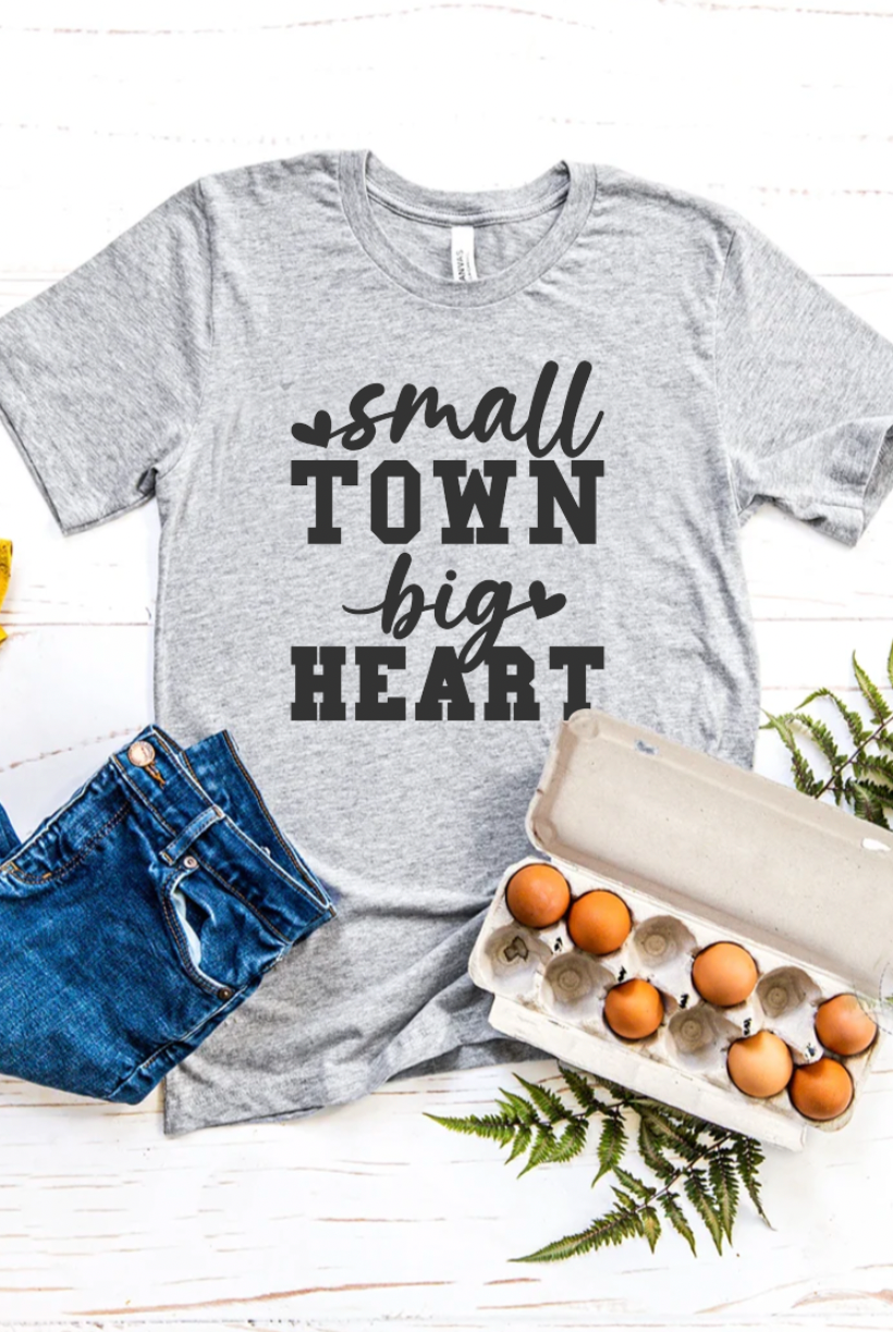 Small Town Big Heart vintage country girl western t-shirt. Unisex T-Shirt from Bella and Canvas in light gray.