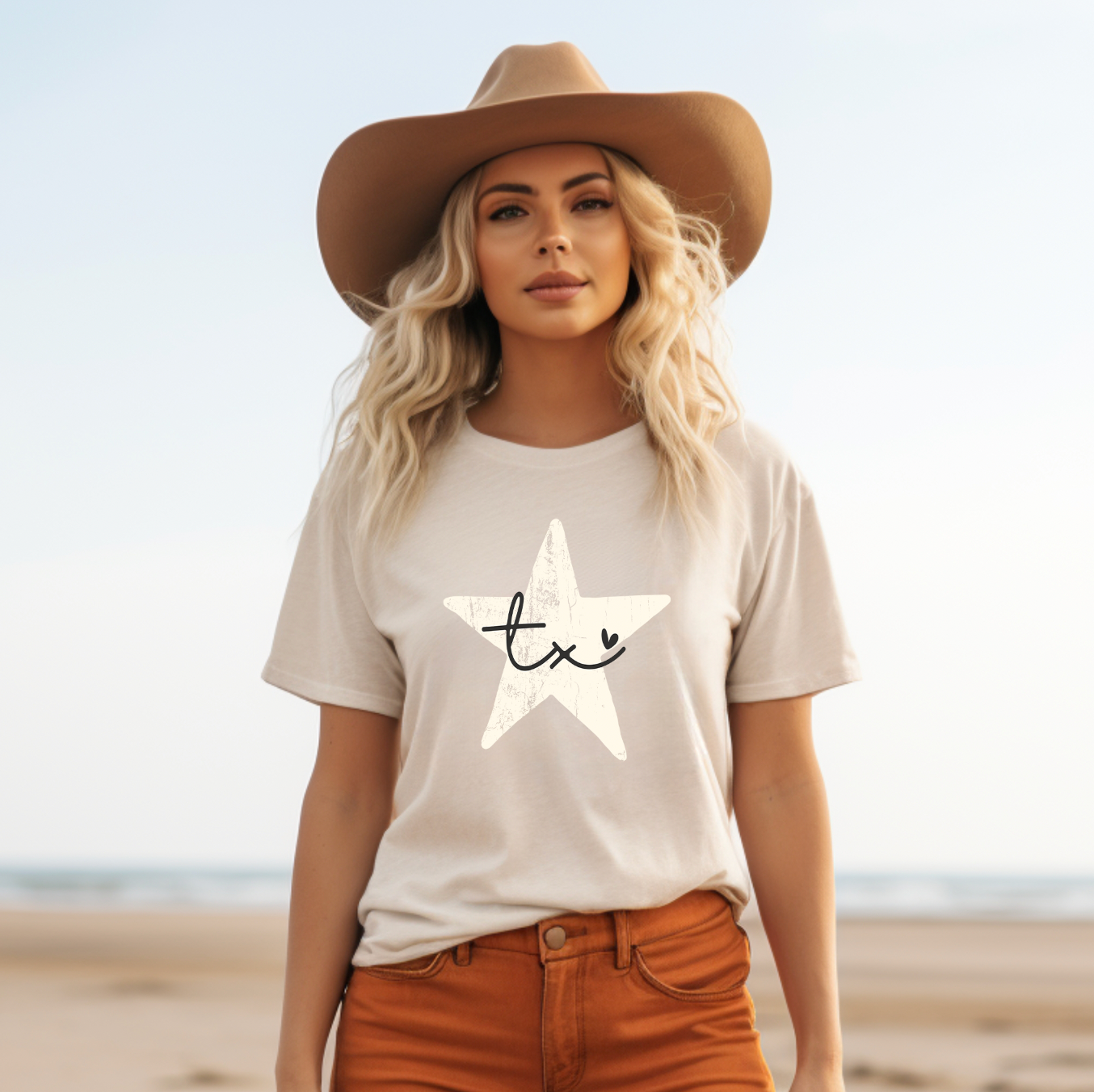 Cream colored soft shirt from Bella and Canvas, this shirt has a rustic star with Texas written in cursive with an adorable heart.