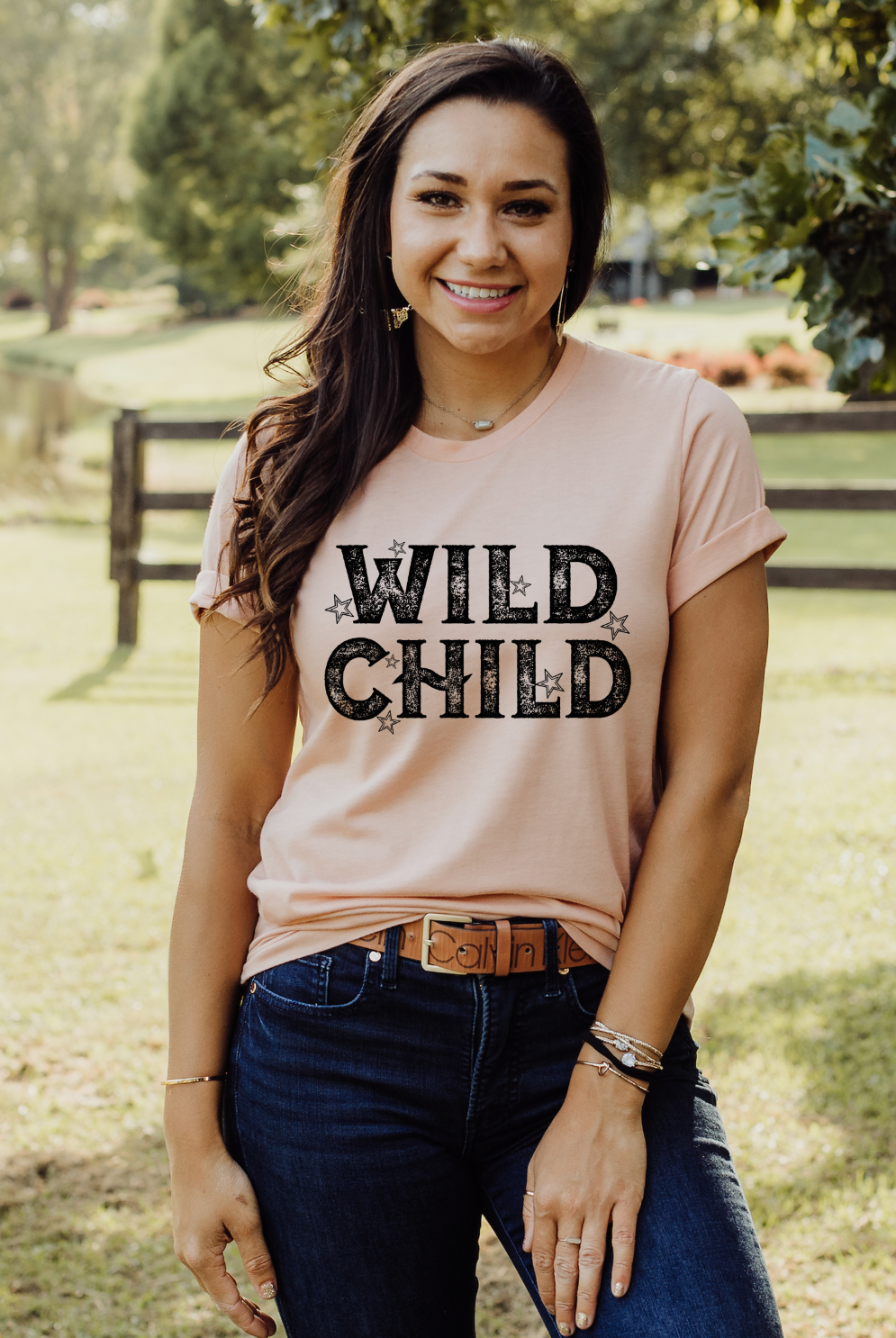 Wild Child Vintage Country Western Unisex Tshirt on Bella and Canvas Shirt in Peach.