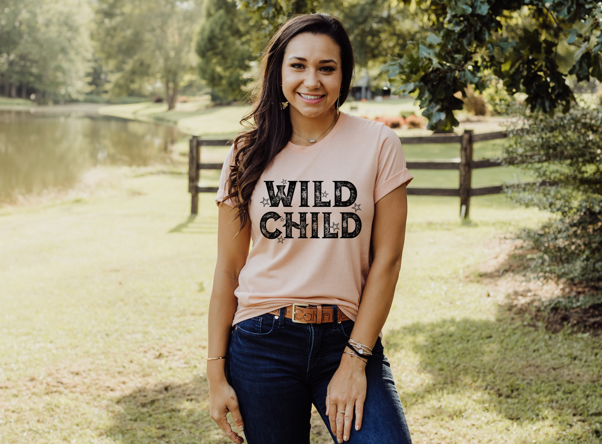 Wild Child Vintage Country Western Unisex Tshirt on Bella and Canvas Shirt in Peach.
