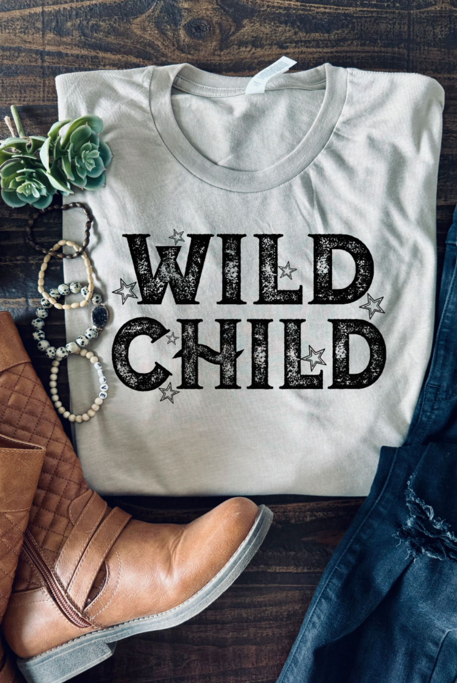 Wild Child Vintage Country Western Unisex Tshirt on Bella and Canvas Shirt in Tan.